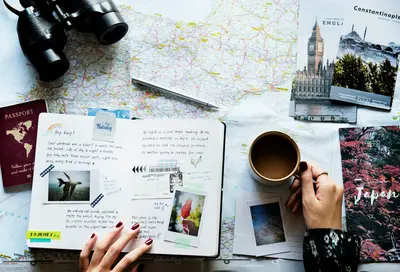 Trip planner notes and map and coffee