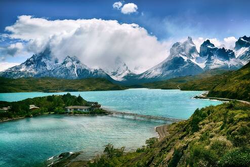 Clouds & hills overlooking water