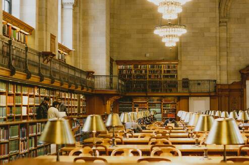 Library interior with tables and books