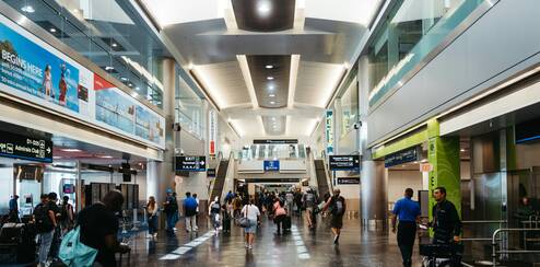 People walking in an airport.