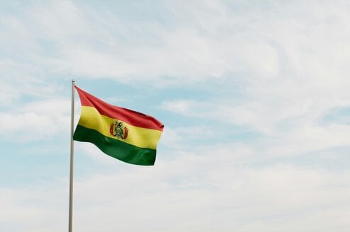 The Bolivian flag waving in the wind