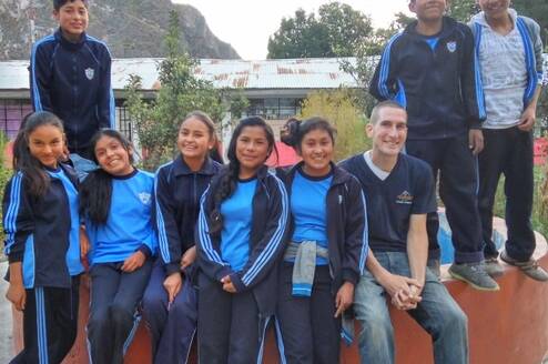 Volunteer Greg with his students