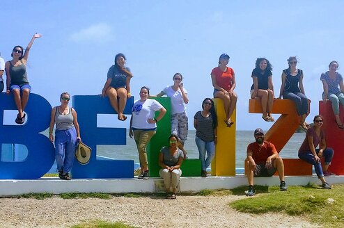 Therapy Abroad Belize people around a Belize Sign