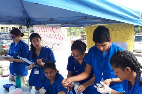 GPSA team during a health fair in Beliez
