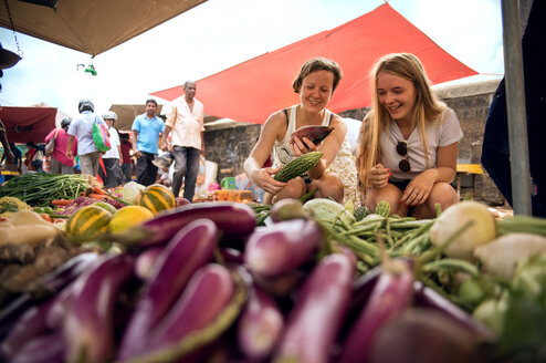 two girls at a local market
