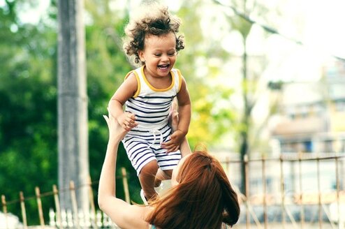 Interesting Au Pair Destinations - Woman playing with child