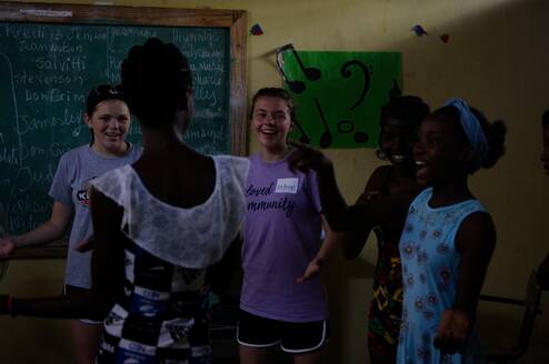 Summer Camp Volunteers teaching our students songs in English!