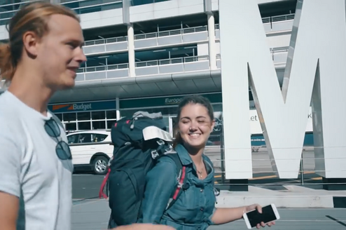 girl at airport with bag