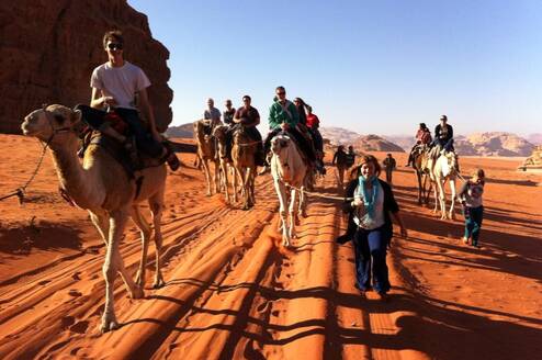 Students explore the Wadi Rum on camels