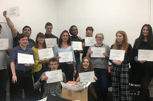 TEFL Graduates Showing their Certificates from London