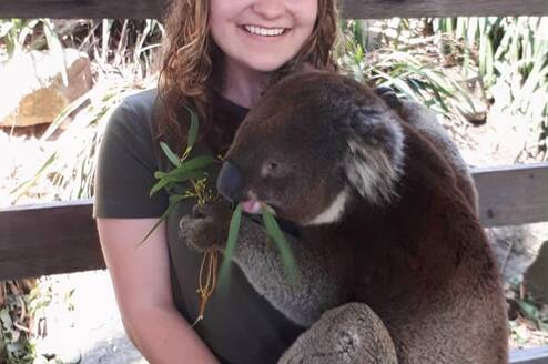 Stepabroad participant holding a koala
