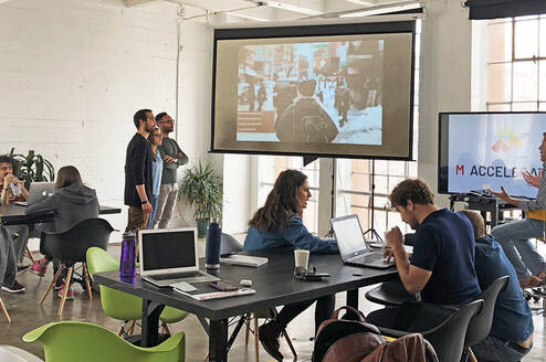 Shot of the classroom in active discussion