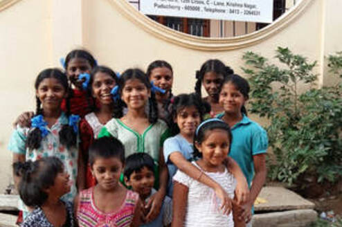 group picture outside Janani Home for Girls