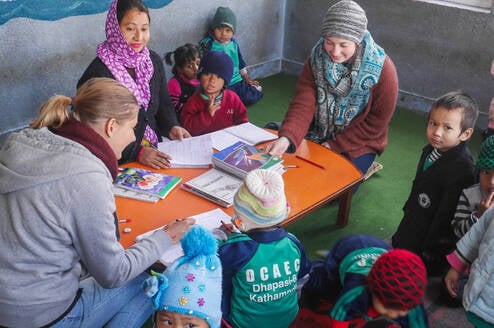 Teach eager to learn children in Nepal
