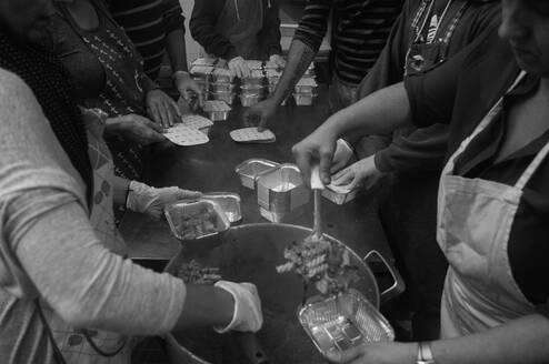 cooking and distributing meals