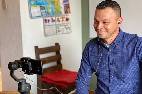 A Spanish Professor at Tico Lingo teaches an online Spanish class to a student in Canada