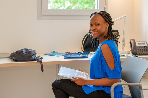 Absolute intern reading information about the Absolute Internship Program