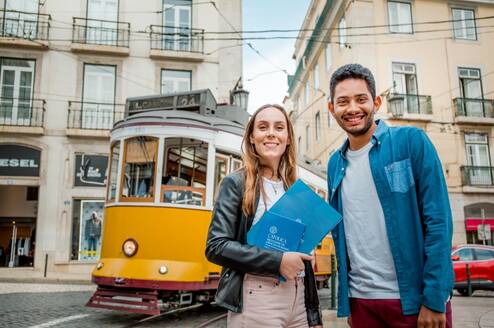 Students pose in front of a cablecar in Lisbon, Portugal