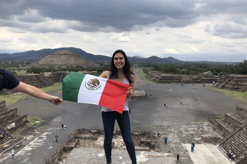 Girl holding Mexico flag