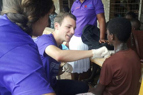 Medical outreach in a school to dress wounds 