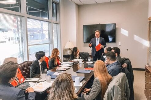 Students meeting w/ a firm