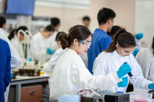 Students conduct physics experiment