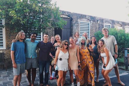 Group of travelers smiling together