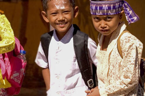 Two children going to school.