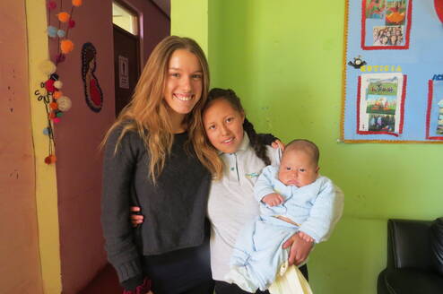 A volunteer with a teenage mother
