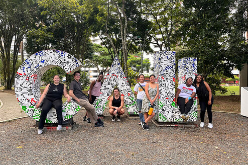 CET Colombia study abroad students pose in front of giant letters spelling "Cali"