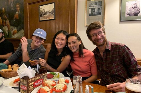 Four CET Prague study abroad students at a restaurant in Prague