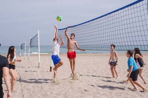 CAMPERS PLAYING BEACH VOLLEY AT IBERIAN CAMPS