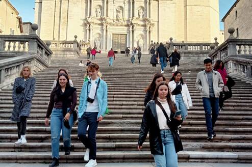 Students walking down stairs