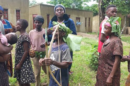The photo was taken when the environmental conservation club visited the Pygmies of Bundibugyo in western Uganda 