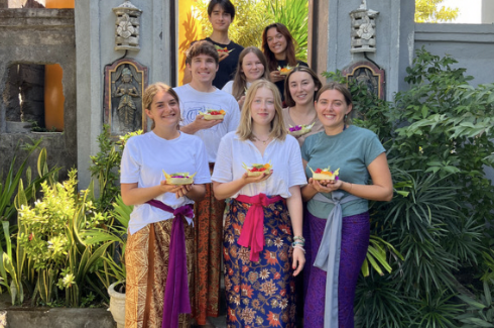 Participants posing with their Balinese offerings Canang Sari 