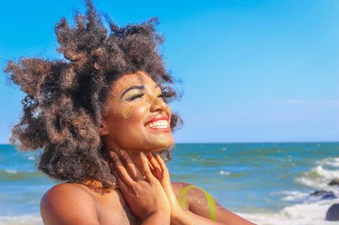 Traveler smiling on the beach