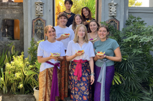 Participants posing with their Balinese offerings Canang Sari 