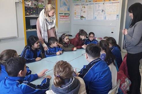Volunteer at work with children