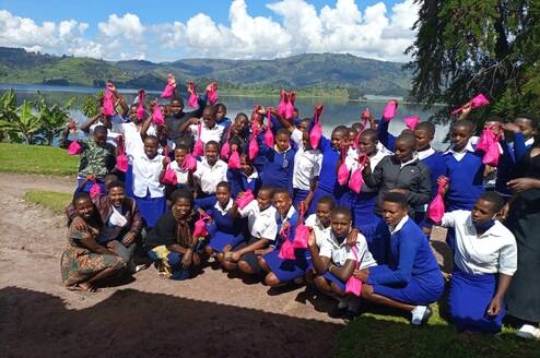 Group of school-going girls with Happy Girls Project's health kit