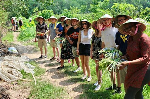 teachers pose for a photo in vietnam