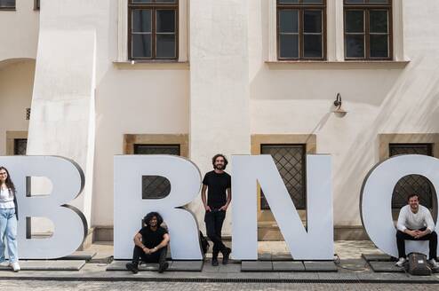 Students with Brno sign