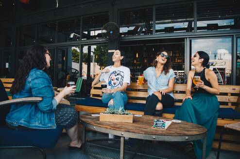 Group of people sitting and talking 