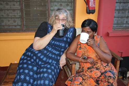Volunteer enjoying tea with Headmistress