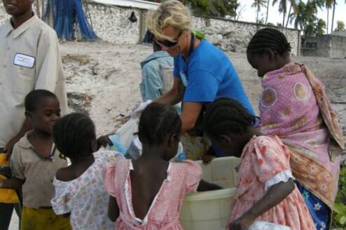 A volunteer with the kids in Haiti