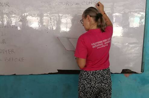 Sisi from France giving lessons to Junior High Students
