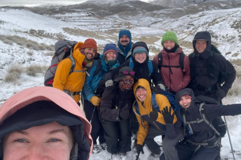 Hiking in snow on the Pisa Mountain Range