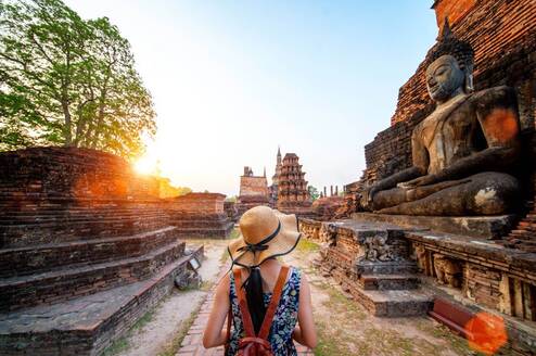 lady walking in Angkor Wat