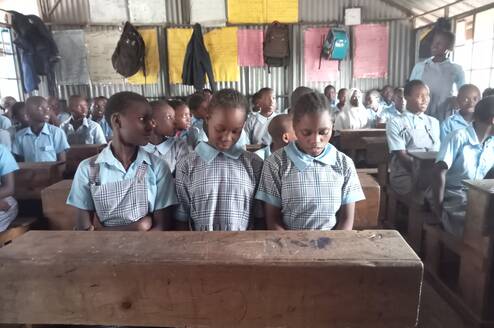 The children are able to attend class because they have sponsors who pays their School fees, buys their school uniforms, books, shoes and medical support.	