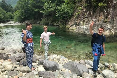 standing by river