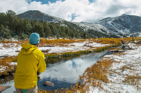 A student tries their hand at fly fishing